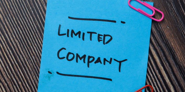 Blue 'post-it' note with the words LIMITED COMPANY in black marker pen.