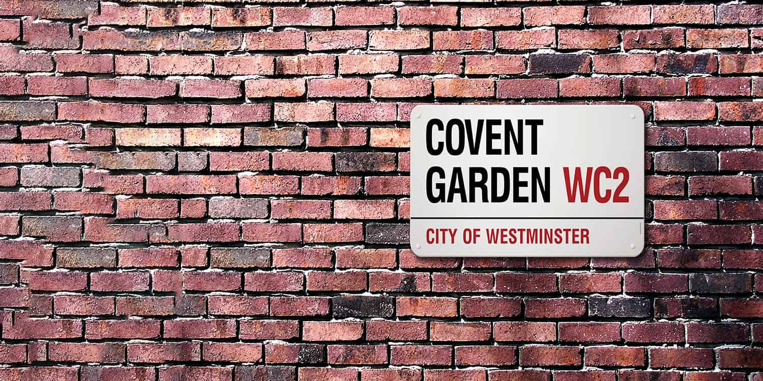 Covent Garden WC2 street sign on brick wall