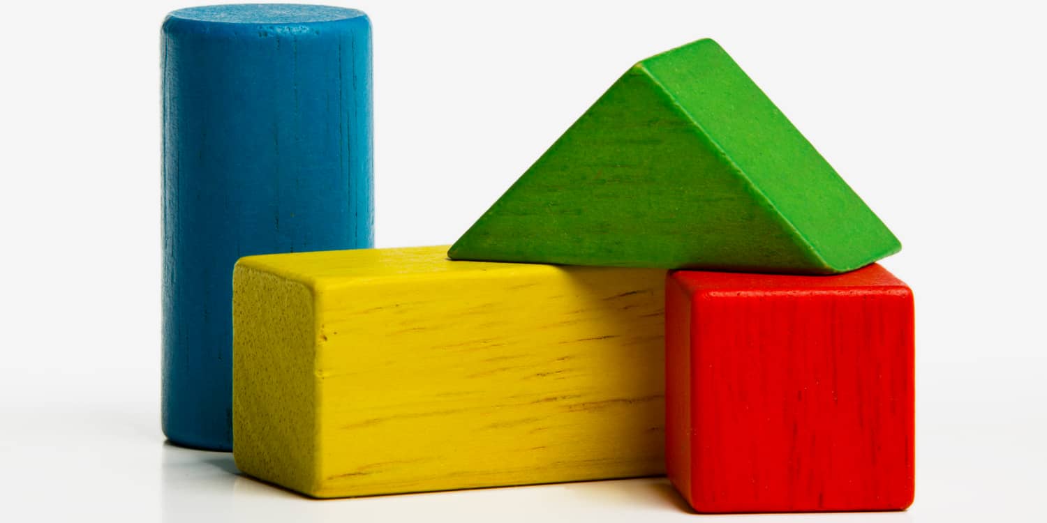 Blue, yellow, green and red toy bricks