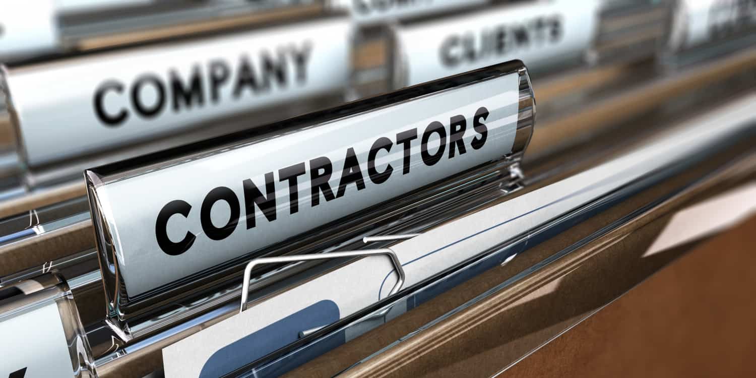 Close up on a file tab with the word contractors, focus on the main word and blur effect.