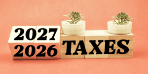 2026/2027 taxes - text shown on wooden cubes