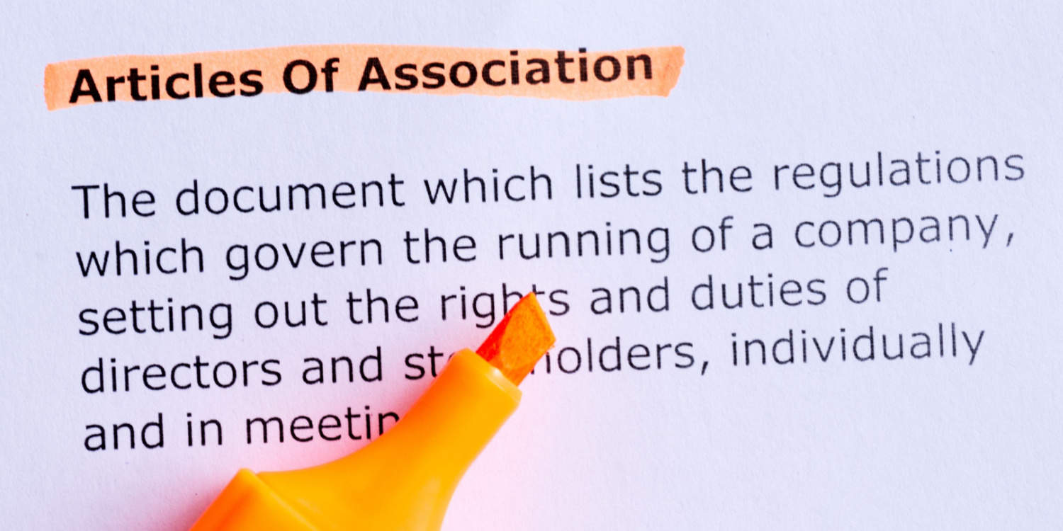 The definition of the articles of association with an orange marker pen highlighting the title 'Articles of Association'.