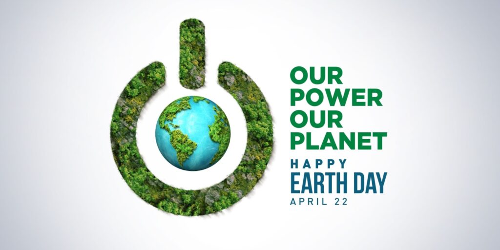 Earth Day 2025 banner set against a pale blue background, featuring a globe and a power icon covered in trees, symbolising sustainability. The theme 'Our Power, Our Planet - Happy Earth Day April 22; is displayed.