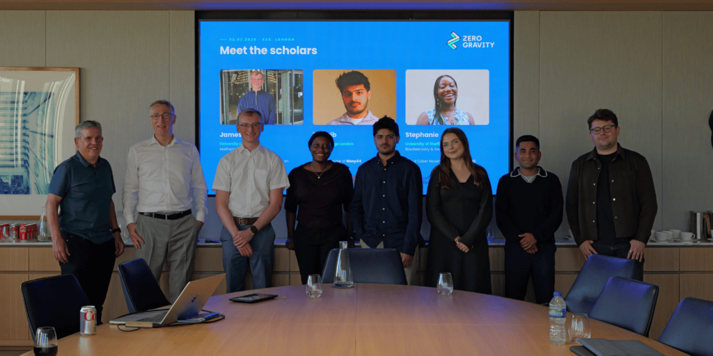 Scholars and facilitators standing together after the Zero Gravity roundtable